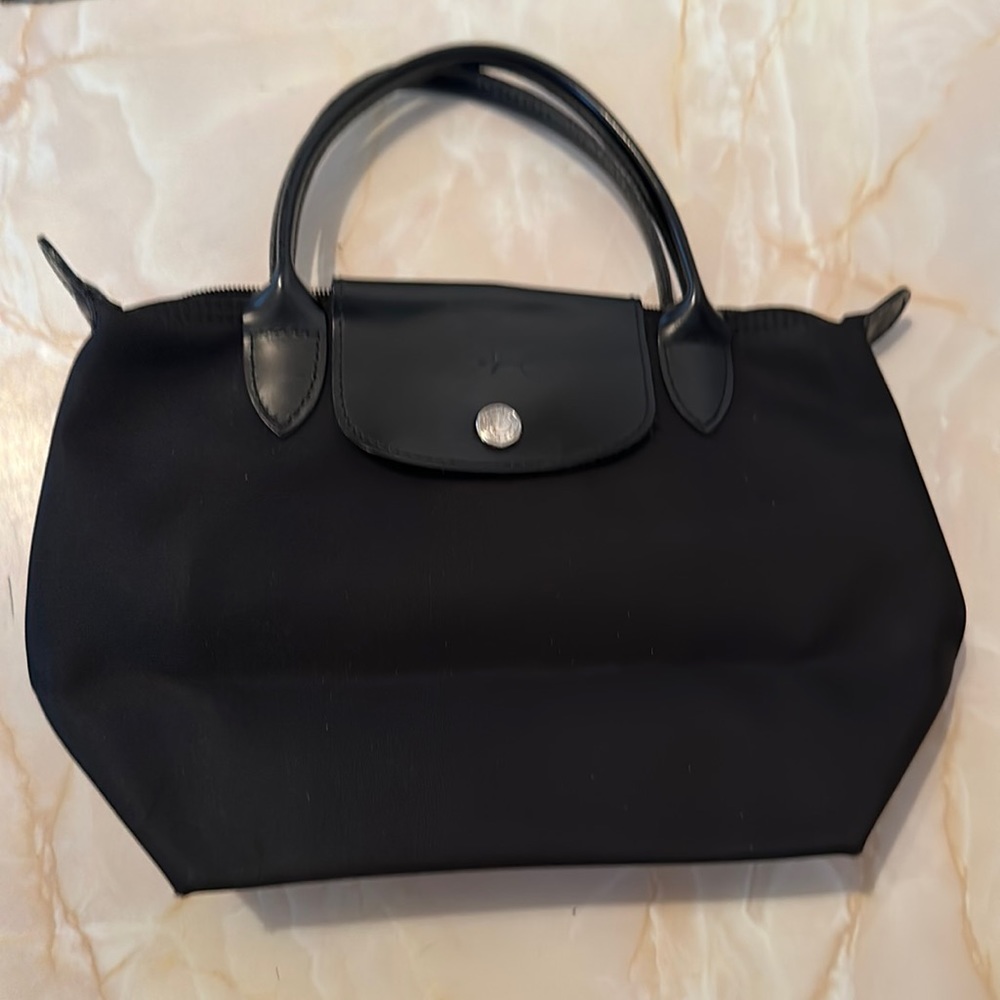 Black on black with silver hardware, Longchamp extra small handbag